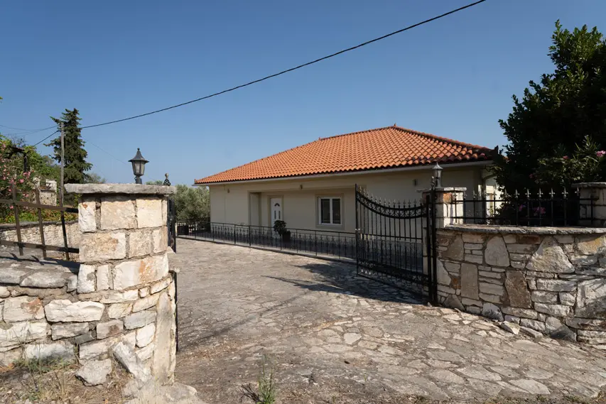 Stone entrance gate and driveway